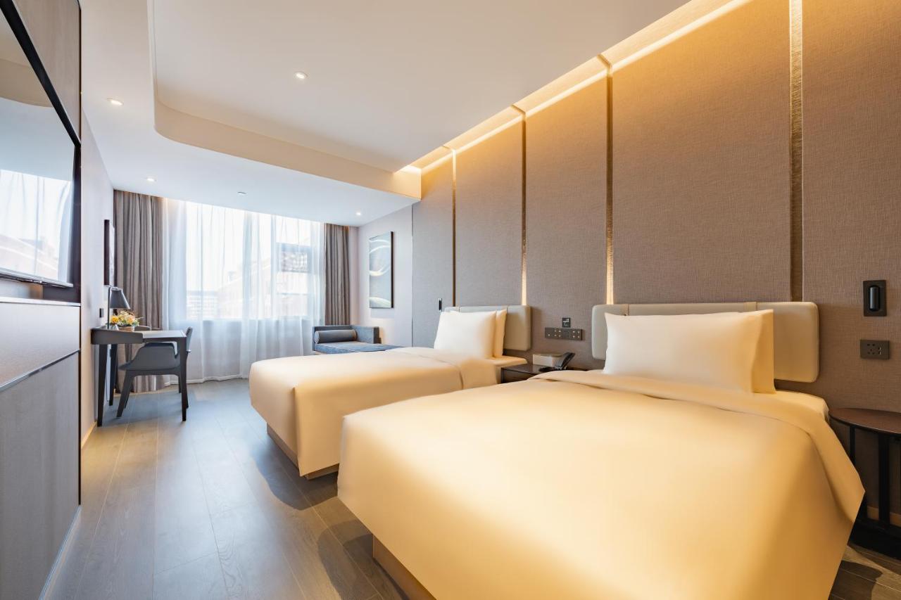 Pudong Caolu Atour Hotel 4*